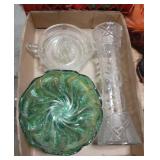 Flat with green glassware, vase, and lemon