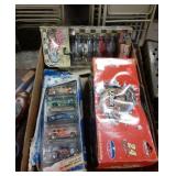 Flat with jurassic park, hot wheels, and Nascar