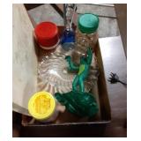 Flat with notice sign , jars of wood pieces, bell