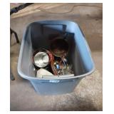 Gray tote of miscellaneous