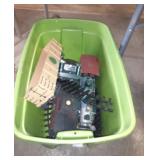 Green tote with train tracks and trai.