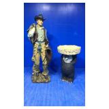 Cowboy and bear. Statues