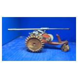 Thompson iron lawn sprinkler tractor