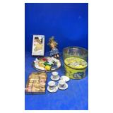 Old tins,dolls, dishes lot