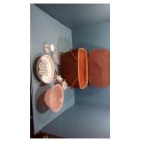 Vintage picnic basket with assorted glass wear