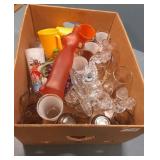 Box with glass cat bottle  and other glass