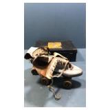 Vintage roller skates in case