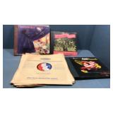 Assorted vintage records.