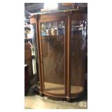 Curved China cabinet with glass shelves
