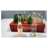 Crate of assorted pop bottles. Stapleton,coke,