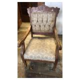 Wood and upholstery sitting chair