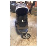 Blue jogging stroller
