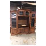 80x90 3 piece entertainment center. Glass doors