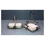 Napkin holder and dishes. Metal holly