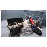 Electrical stuff,cassettes, cameras in blue crate