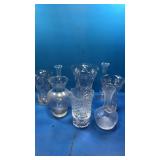 8 clear vases. Some crystal?