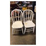 2 white wood chairs
