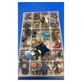 Flat of costume jewelry