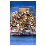 Plastic tray of costume jewelry