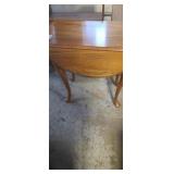 A pair of dop leaf in tables