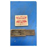 Between the acts. Cigar tin , wood with contents