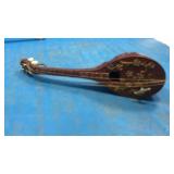 11 inch musical mandalin. Hand carved