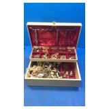 Vintage jewelry box with contents