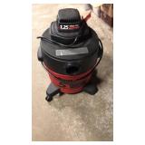 1.25 shop vac. Works. Missing a wheel