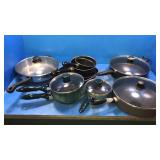 Red tote of Pots and pans and skillets