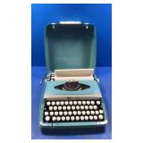 Smith Corona blue typewriter