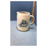 Crock pitcher with rabbit
