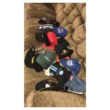 Tote of racing ballcaps