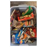 Tote full of cars and trucks