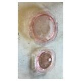 2 pink depression plates