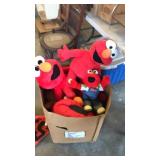 Box of Elmos plush toys