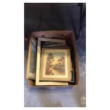 Box of framed pictures