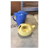 Blue and yellow ceramic pitchers