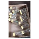 Small bottles w plastic lids