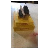 Yellow cubby boxes,brushes