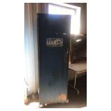 Blue wood cabinet on wheels