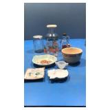 Orange juice and glasses,bottles,bowl