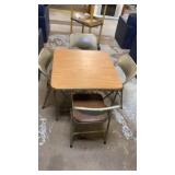 Brown padded card table on four chairs nice