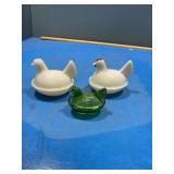 3 small hen on nest (green one is chipped)