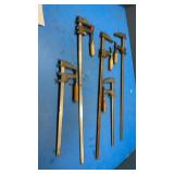 Five wood handled clamps