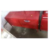 Long red tool chest on legs.