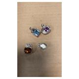 4 silver pendants with stones