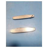 2 slim silver knives