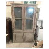primitive glass front  cabinet