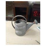 Galvanized watering can