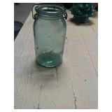 Ball jar with the letter v